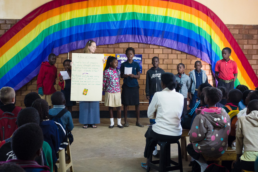 Sharing our poem in front of the school
